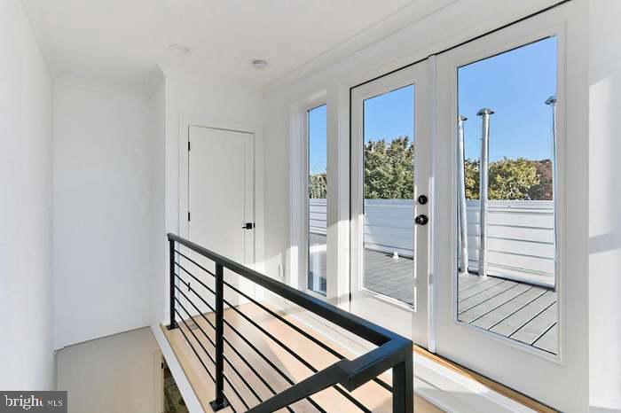 1313 Orren Street Northeast, Unit 3 Washington, DC 20002 - Photo 20 of 24 Bright and airy hallway with modern flair.