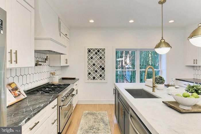 1313 Orren Street Northeast, Unit 3 Washington, DC 20002 - Photo 7 of 24 Modern kitchen with elegant finishes.
