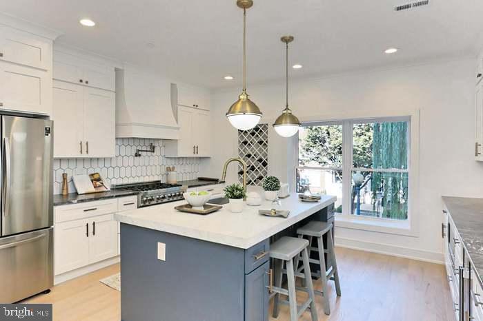 1313 Orren Street Northeast, Unit 3 Washington, DC 20002 - Photo 9 of 24 Modern kitchen with elegant finishes.