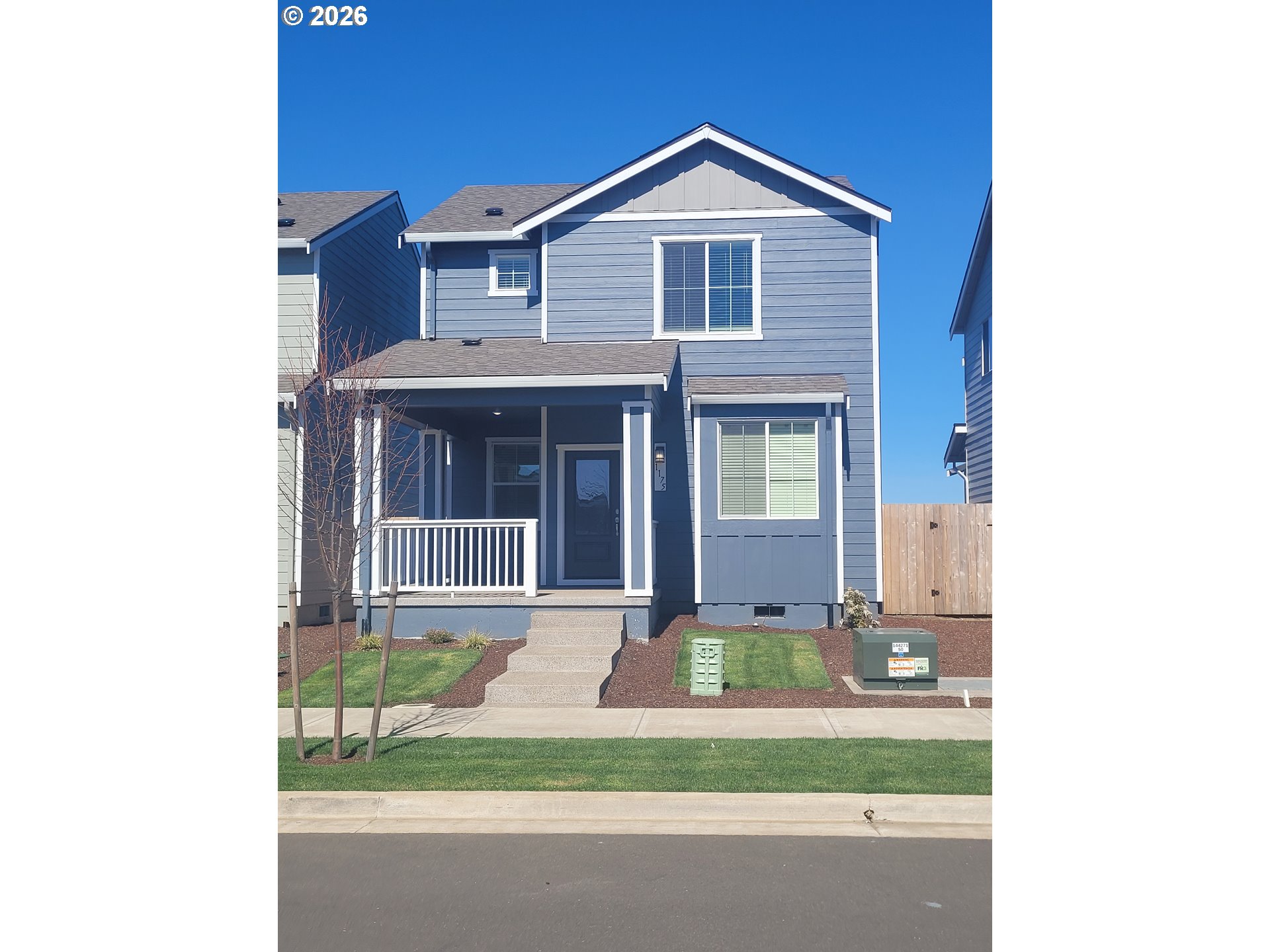 1175 Parkside Avenue Woodburn, OR 97071 - Photo 1 of 15 a front view of a house with a yard