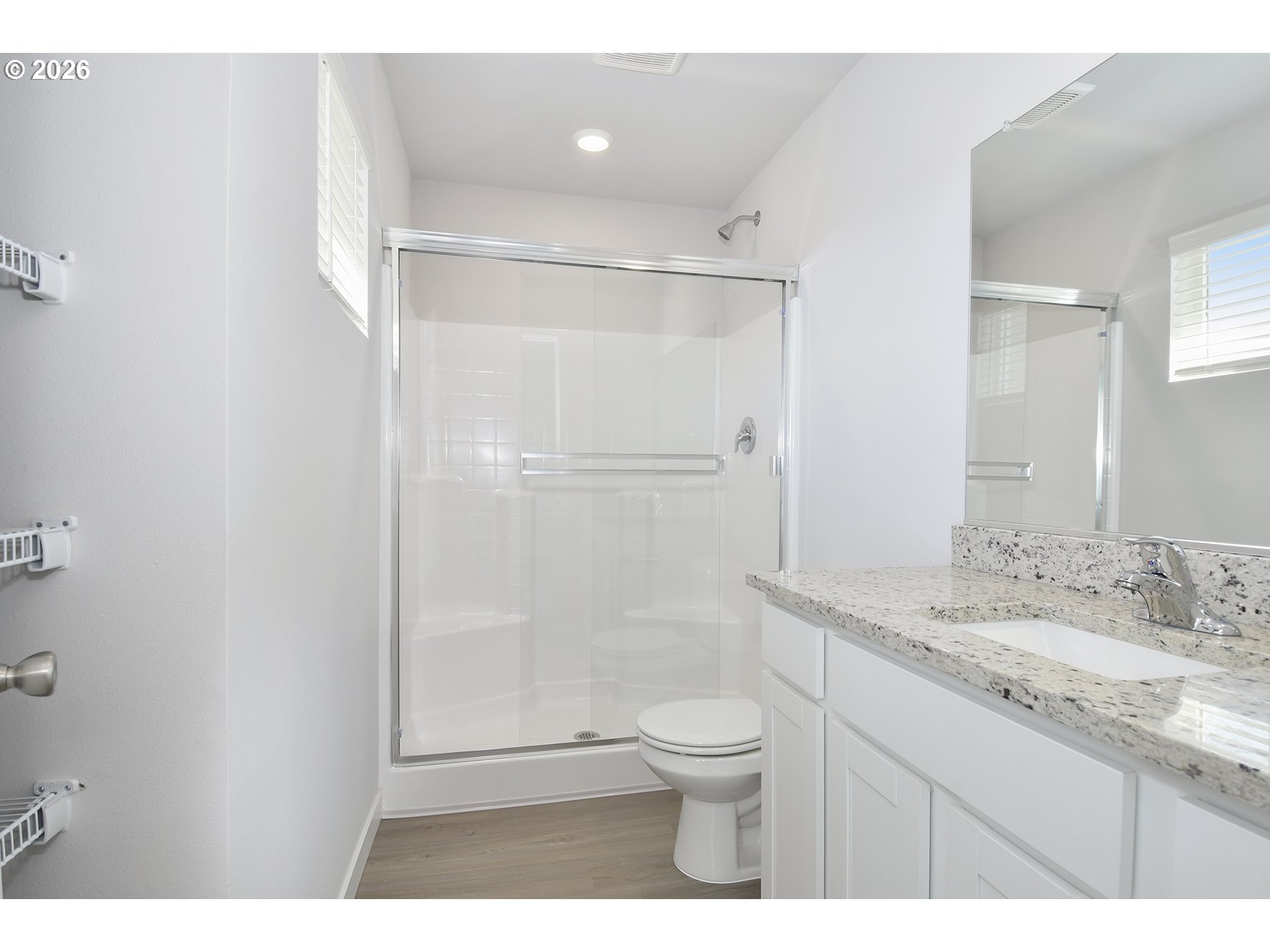 1175 Parkside Avenue Woodburn, OR 97071 - Photo 11 of 15 a bathroom with a granite countertop sink toilet and shower