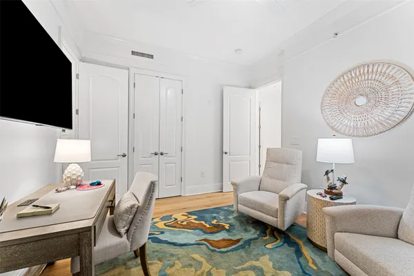 a bathroom with a sink a mirror and a shower