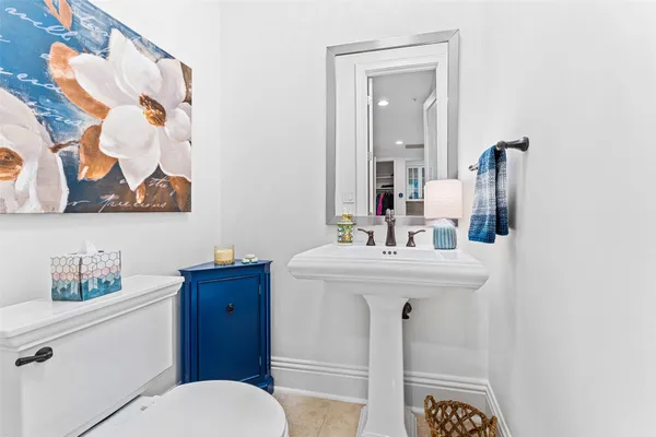 a workspace with a couch and a window