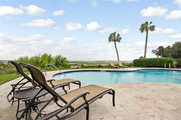 a kitchen with stainless steel appliances granite countertop a stove and a refrigerator