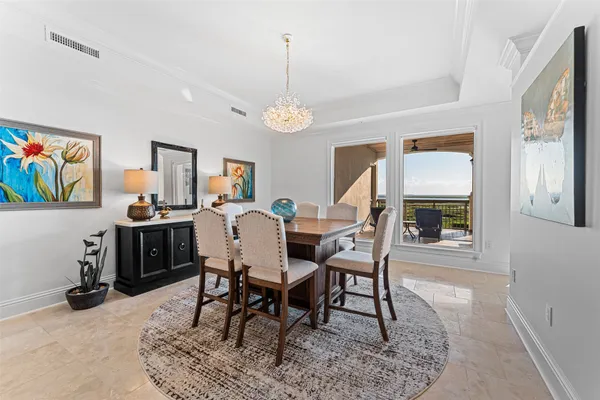 a kitchen with stainless steel appliances granite countertop a sink and a refrigerator