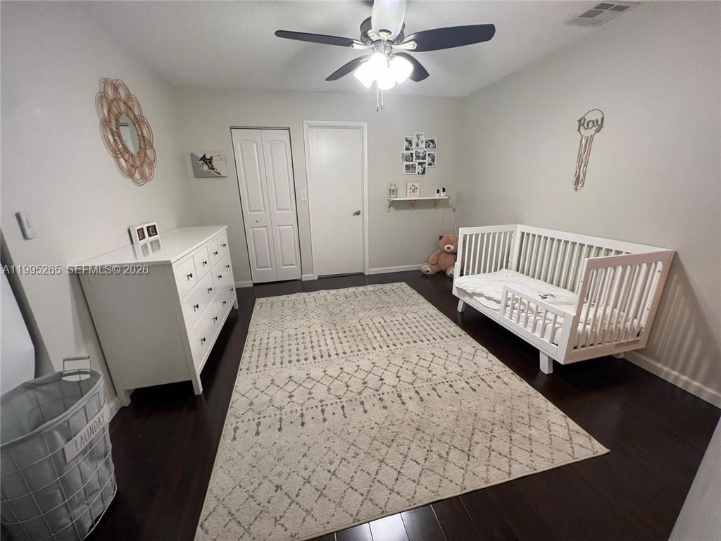 307 Bonnie Brae Way, Unit 26 Hollywood, FL 33021 - Photo 11 of 21 a living room with furniture and a window