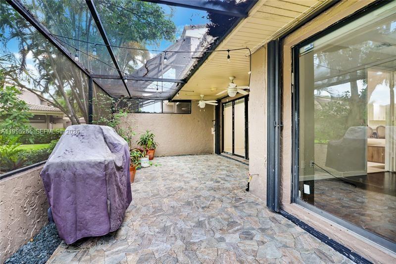 307 Bonnie Brae Way, Unit 26 Hollywood, FL 33021 - Photo 20 of 21 a view of a porch with furniture