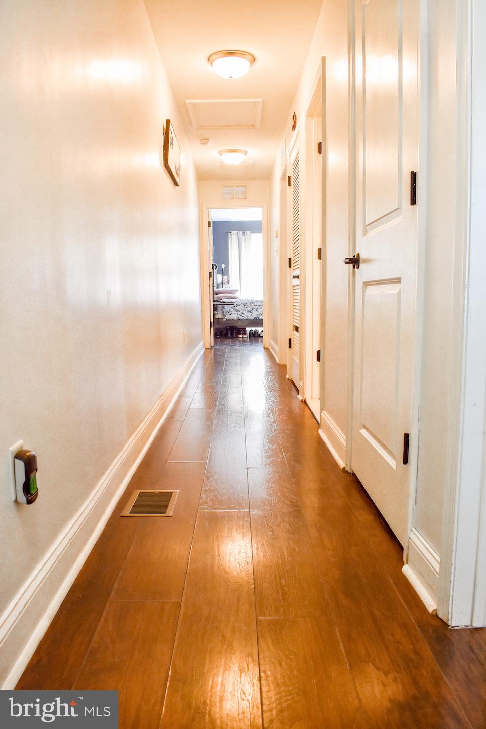 25 Rowand Way East Clementon, NJ 08021 - Photo 7 of 15 Inviting hallway with warm tones.