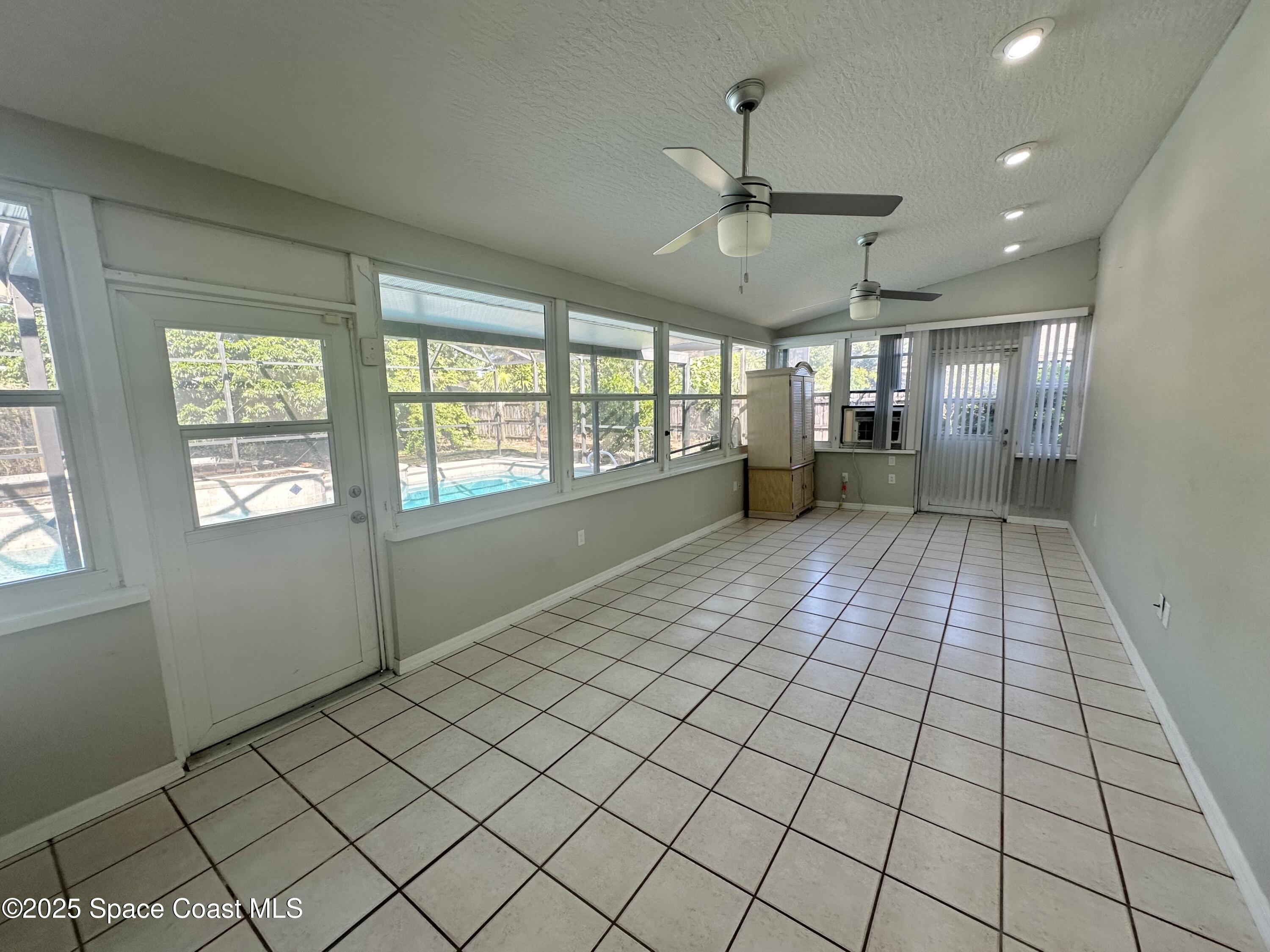4140 Delespine Road Cocoa, FL 32927 - Photo 11 of 12 a view of an empty room and window