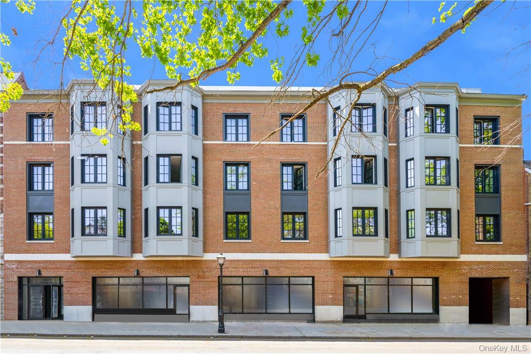 139 Fifth Avenue, Unit 5C Pelham, NY 10803 - Photo 1 of 32 a front view of a multi story building