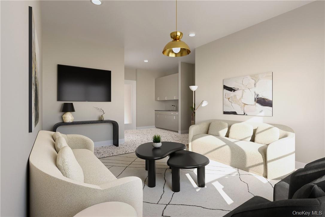 139 Fifth Avenue, Unit 5C Pelham, NY 10803 - Photo 21 of 32 a living room with furniture and a flat screen tv