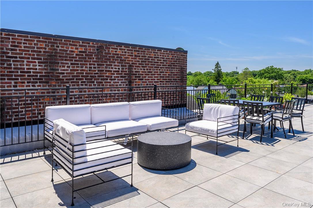 139 Fifth Avenue, Unit 5C Pelham, NY 10803 - Photo 26 of 32 a view of a patio