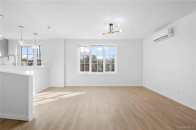 a view of kitchen and windows