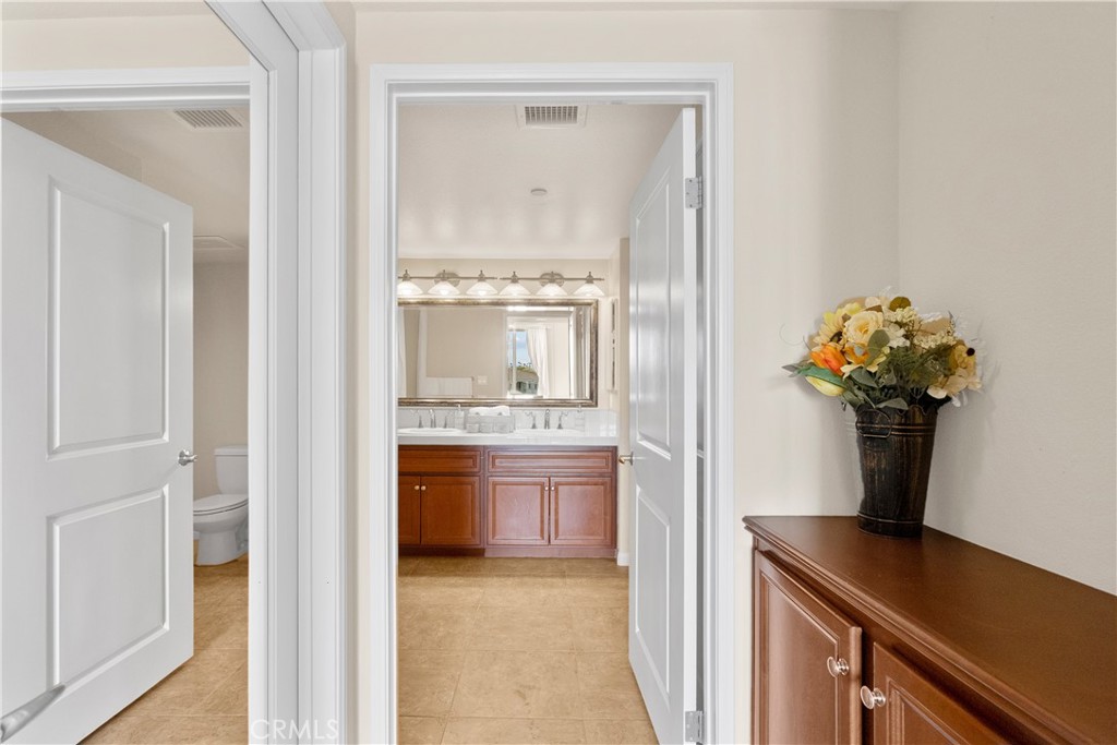 4240 Tradewinds Drive Oxnard, CA 93035 - Photo 32 of 43 a room that has a lot of flowers in it