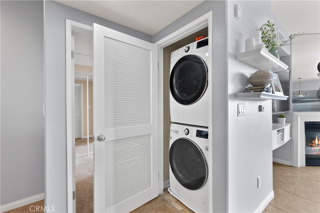 4240 Tradewinds Drive Oxnard, CA 93035 - Photo 36 of 43 a view of a hallway with washer and dryer