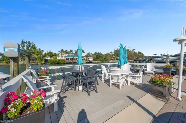 a view of a tables and chairs in patio