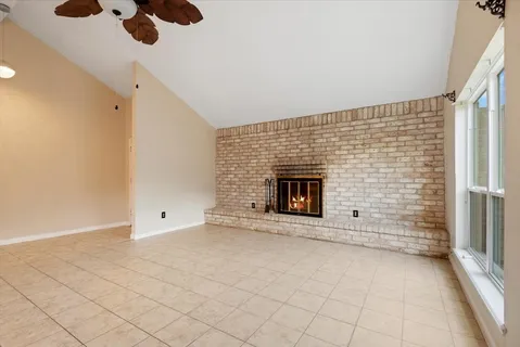 wooden floor in an empty room and a window