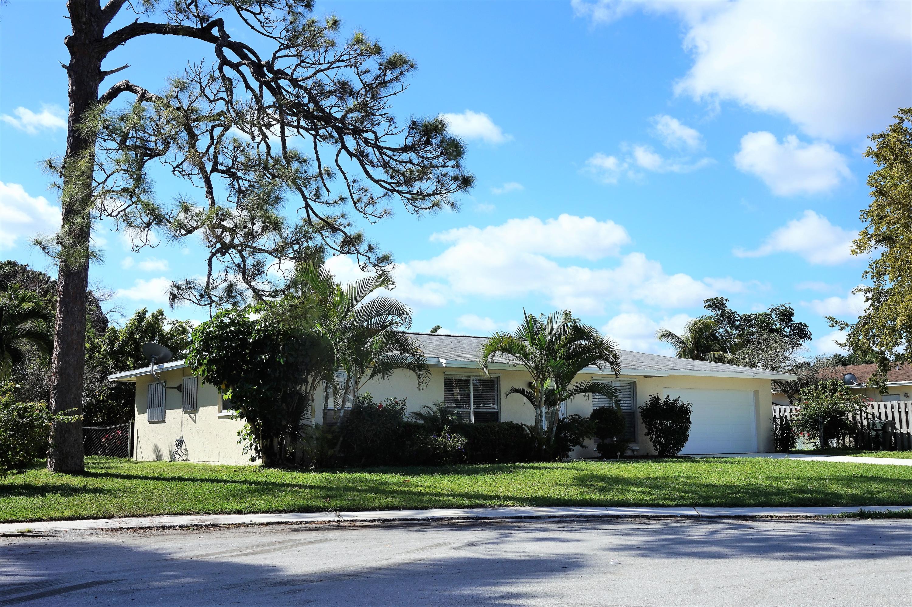 1740 Southwest 12th Street Boca Raton, FL 33486 - Photo 1 of 16 front