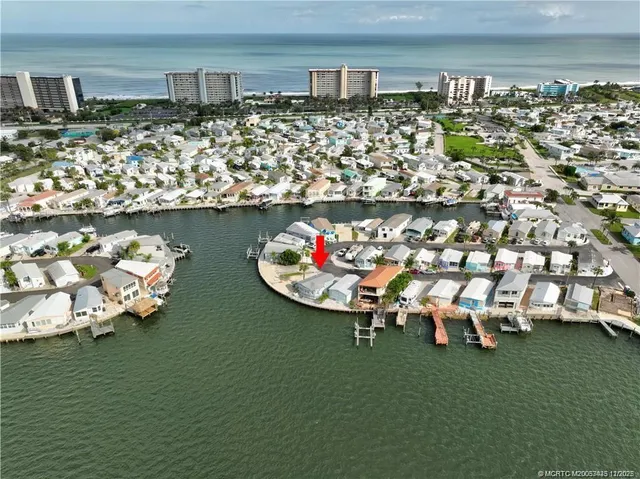 a group of people sitting on a lawn chair in a room