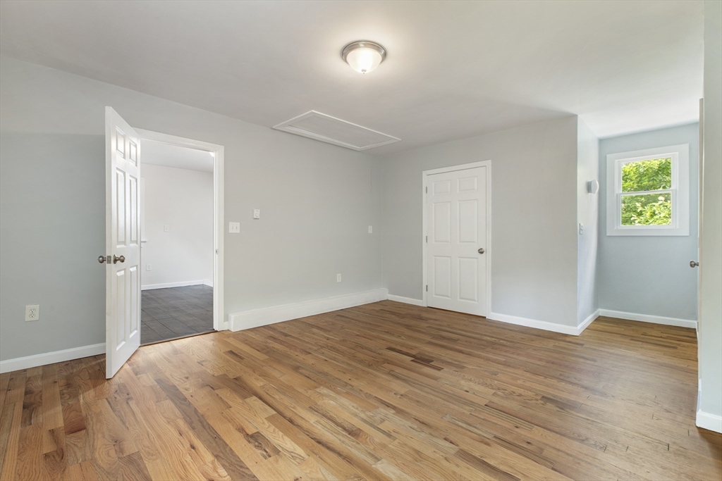 68 Birch Hill Road Douglas, MA 01516 - Photo 24 of 40 a bedroom with a bed and a dresser