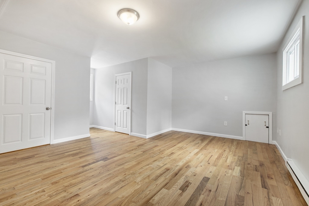 68 Birch Hill Road Douglas, MA 01516 - Photo 25 of 40 an empty room with wooden floor