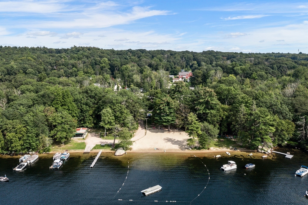 68 Birch Hill Road Douglas, MA 01516 - Photo 3 of 40 a view of a lake with lots of trees