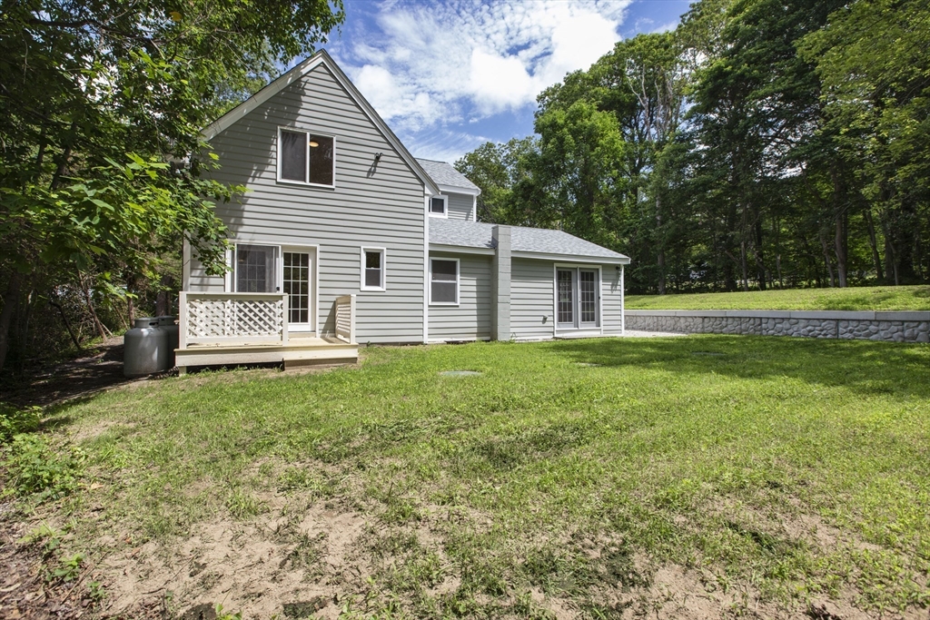 68 Birch Hill Road Douglas, MA 01516 - Photo 32 of 40 a front view of a house with a yard