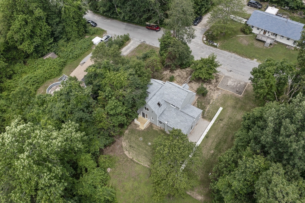 68 Birch Hill Road Douglas, MA 01516 - Photo 33 of 40 an aerial view of a house with a yard and garden