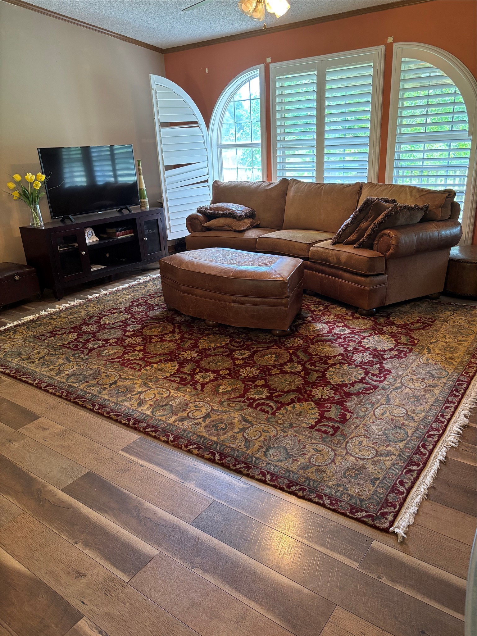 35599 State Highway South Buna, TX 77612 - Photo 16 of 40 a living room with furniture and a flat screen tv