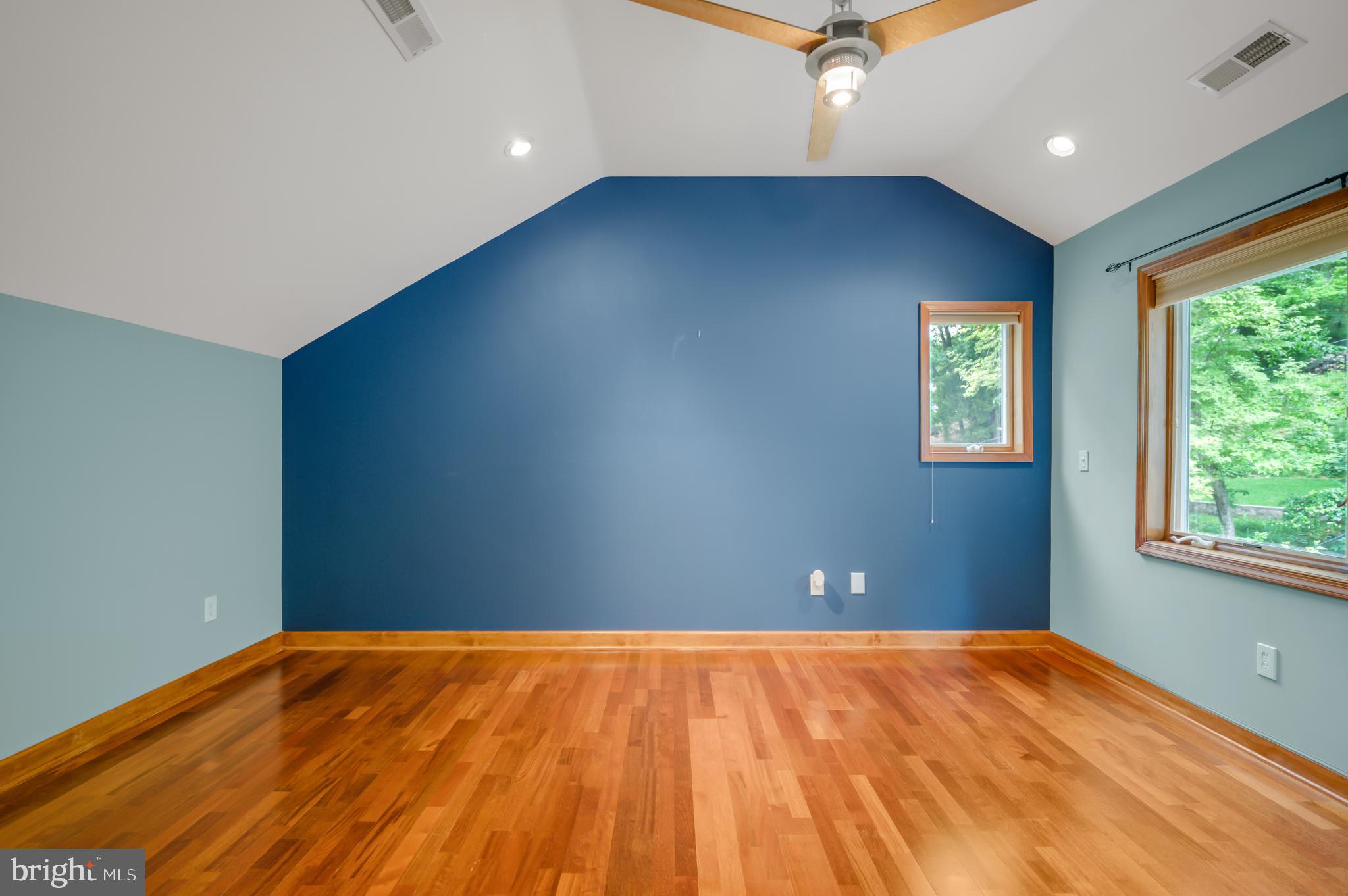 3111 North Thomas Street Arlington, VA 22207 - Photo 13 of 40 a view of a big room with a ceiling fan and window