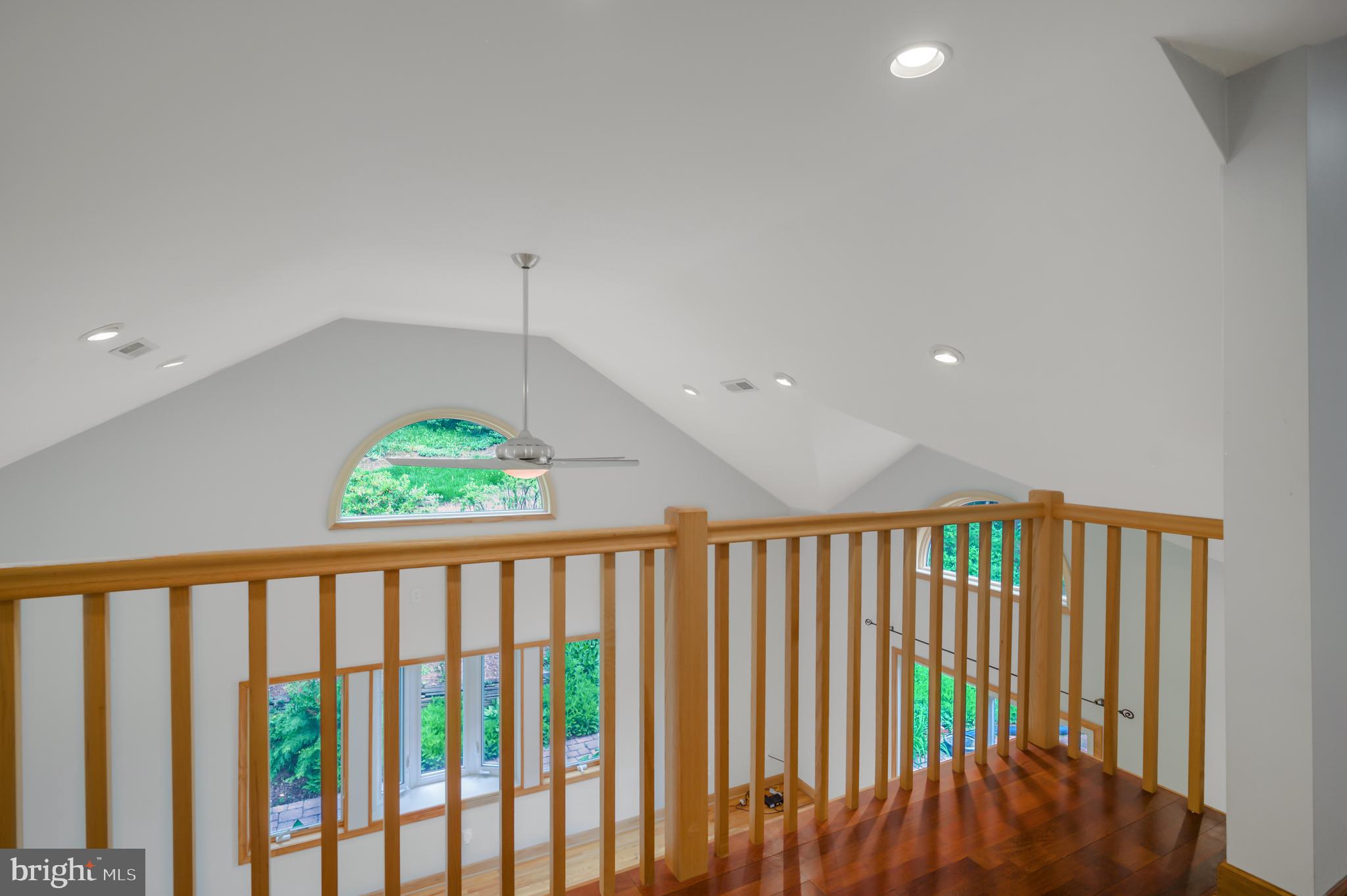 3111 North Thomas Street Arlington, VA 22207 - Photo 15 of 40 a view of staircase with a white floor to ceiling window