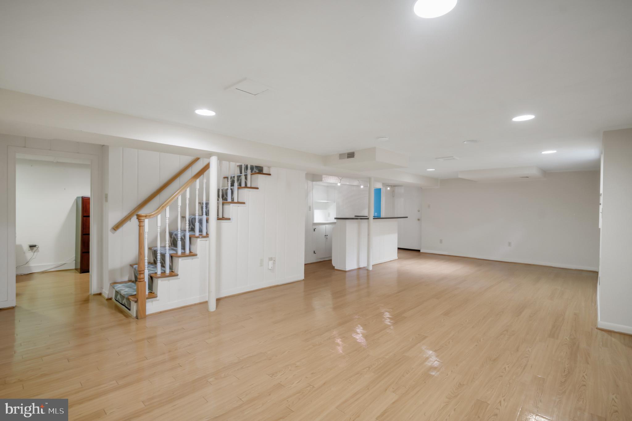 3111 North Thomas Street Arlington, VA 22207 - Photo 26 of 40 a view of empty room with wooden floor