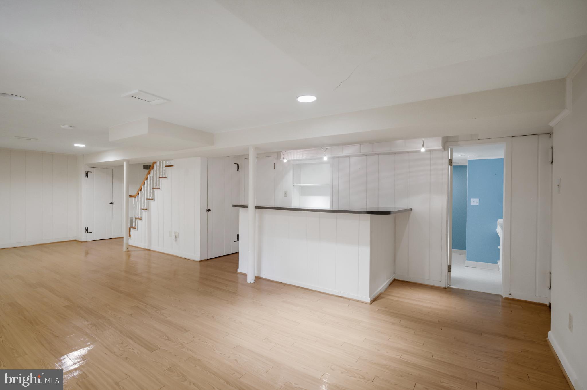 3111 North Thomas Street Arlington, VA 22207 - Photo 28 of 40 a view of an empty room with wooden floor