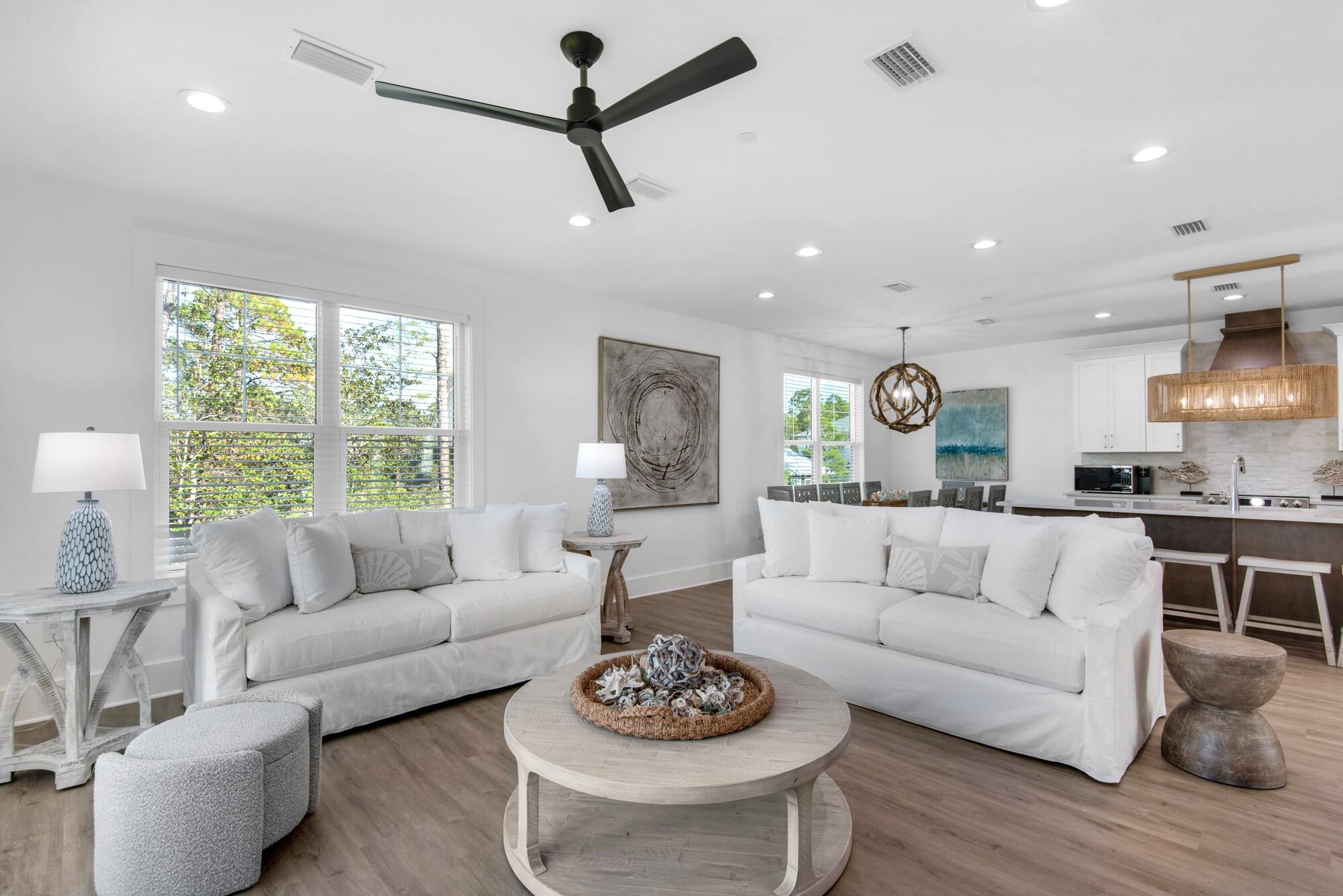 6528 West County Highway 30A Santa Rosa Beach, FL 32459 - Photo 11 of 87 a living room with furniture and a large window