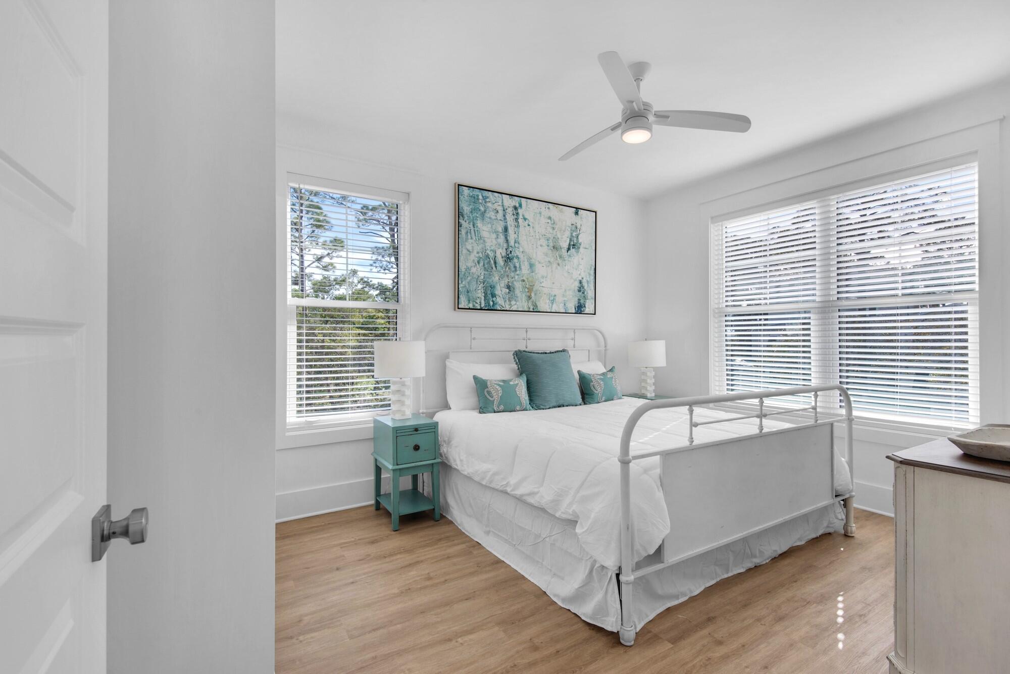 6528 West County Highway 30A Santa Rosa Beach, FL 32459 - Photo 13 of 87 a bed room with a bed and a window