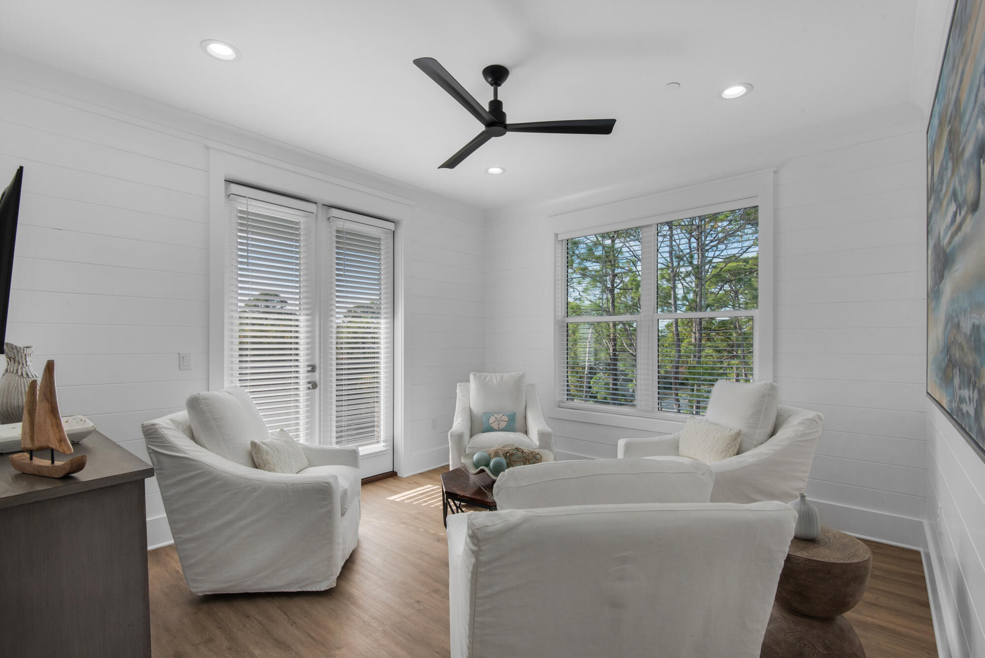 6528 West County Highway 30A Santa Rosa Beach, FL 32459 - Photo 40 of 87 a living room with furniture and a large window