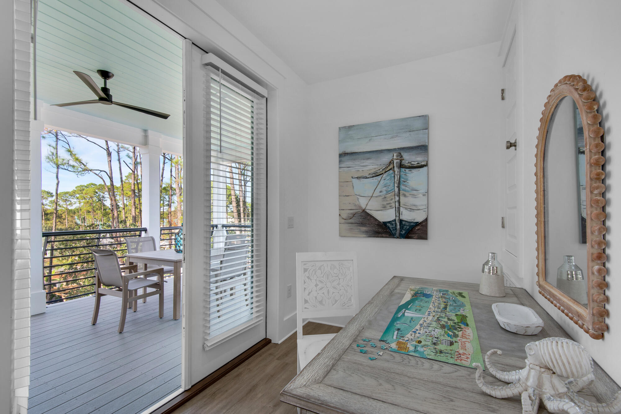 6528 West County Highway 30A Santa Rosa Beach, FL 32459 - Photo 42 of 87 a living room with furniture and a table