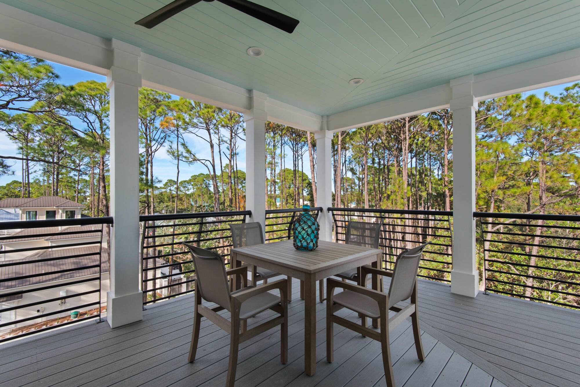 6528 West County Highway 30A Santa Rosa Beach, FL 32459 - Photo 43 of 87 a view of a dining room with furniture window and wooden floor