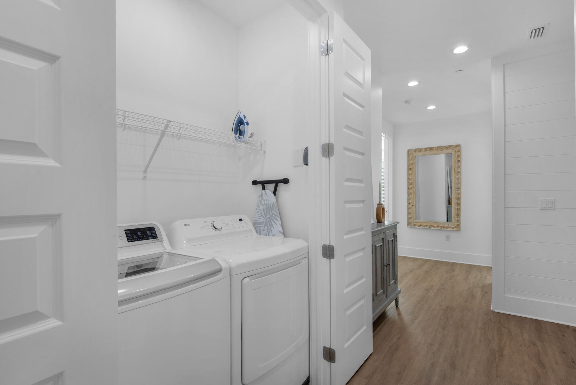 6528 West County Highway 30A Santa Rosa Beach, FL 32459 - Photo 46 of 87 a view of utility room with washer and dryer