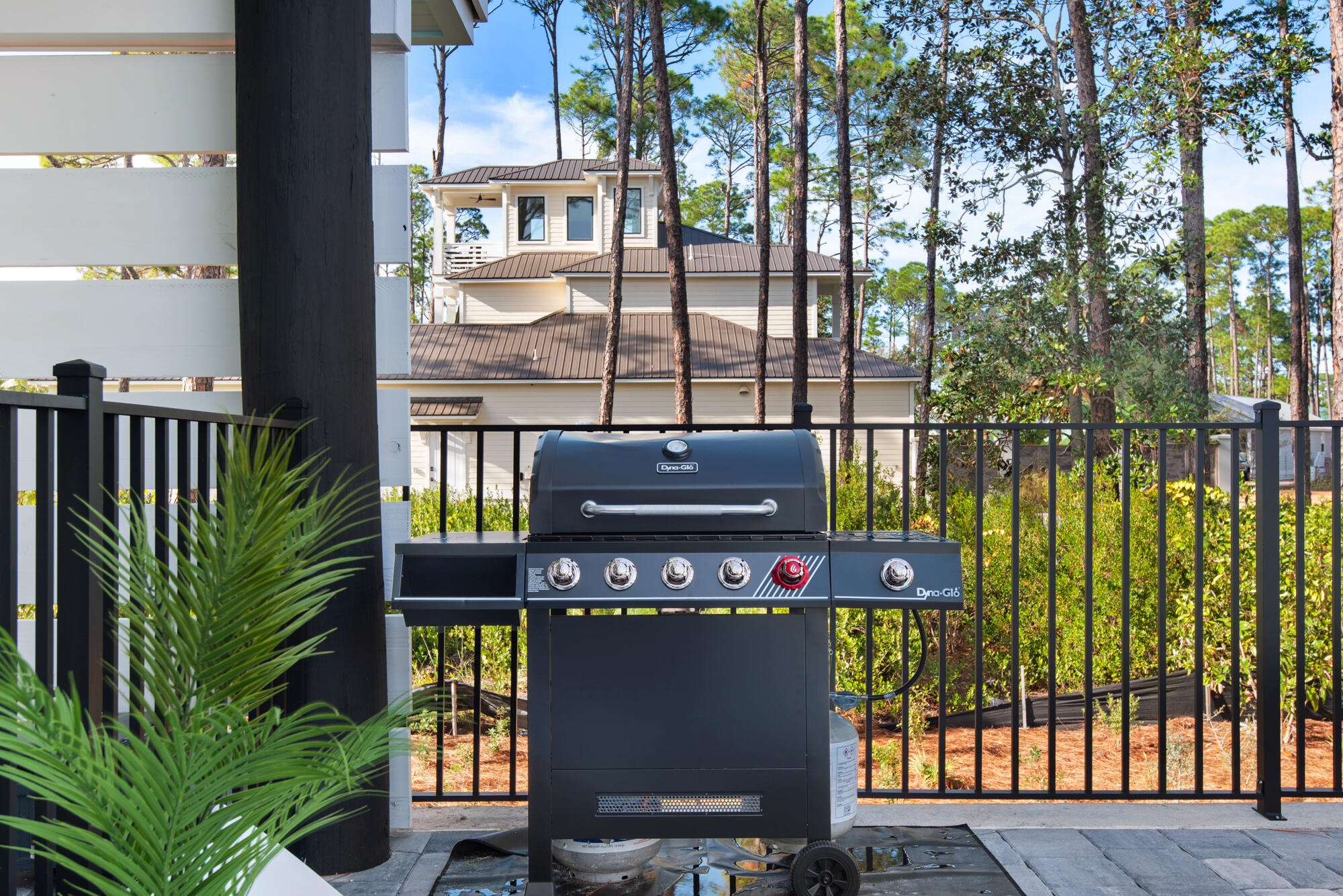 6528 West County Highway 30A Santa Rosa Beach, FL 32459 - Photo 47 of 87 a front view of a house with a garden