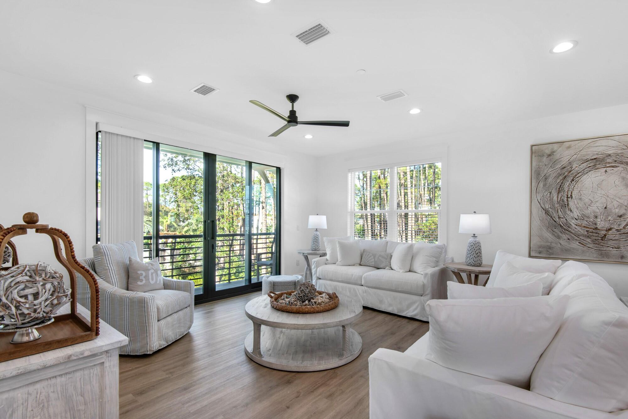 6528 West County Highway 30A Santa Rosa Beach, FL 32459 - Photo 10 of 87 a living room with furniture and a large window