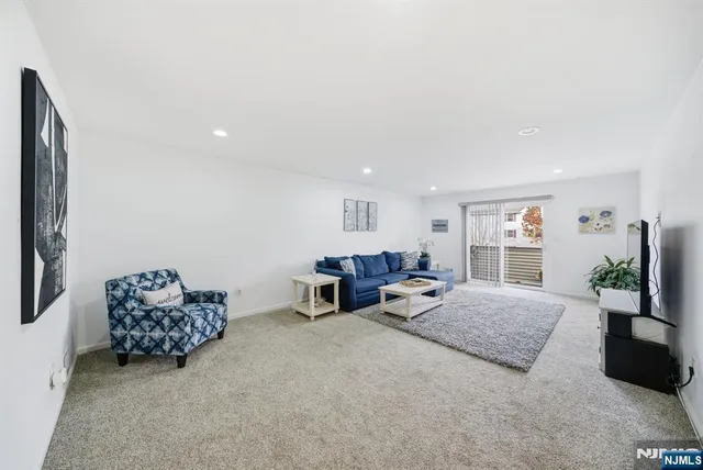 a living room with furniture window and couch