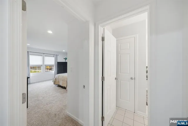a en suite bathroom with a sink and mirror