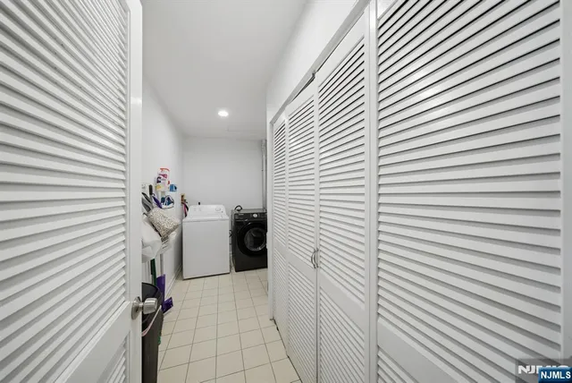a view of a room with washer and dryer