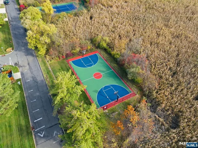 a view of park with wooden stairs and a big yard