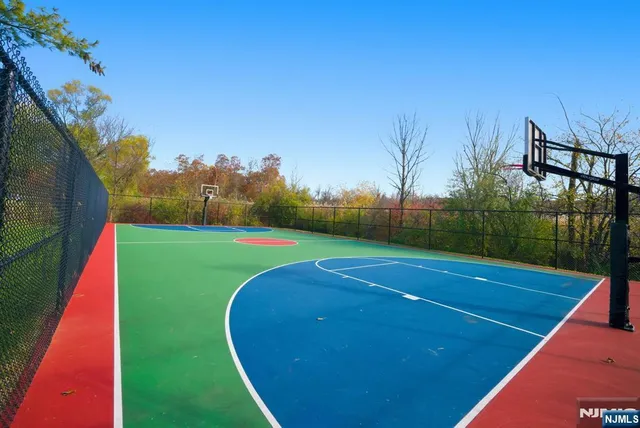 a view of a chairs and table on the wooden deck