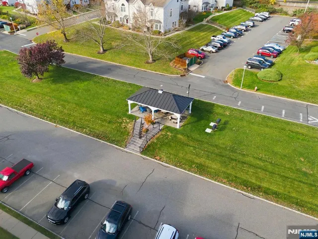 a view of an outdoor dining space with a patio