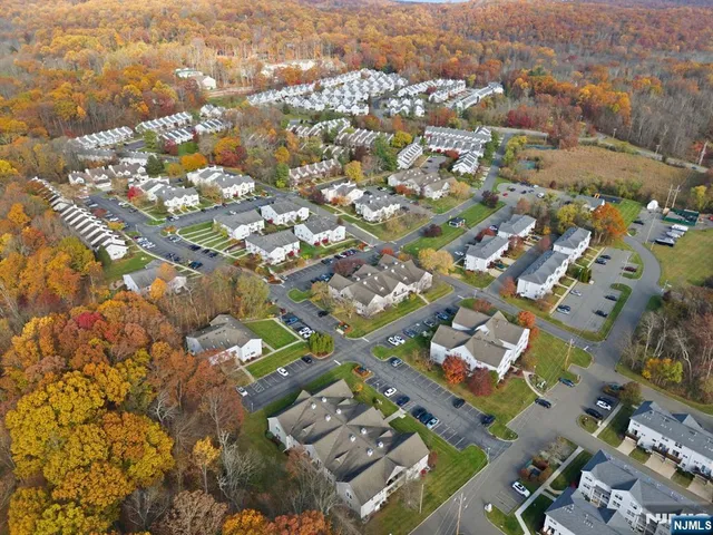 an aerial view of a house having yard