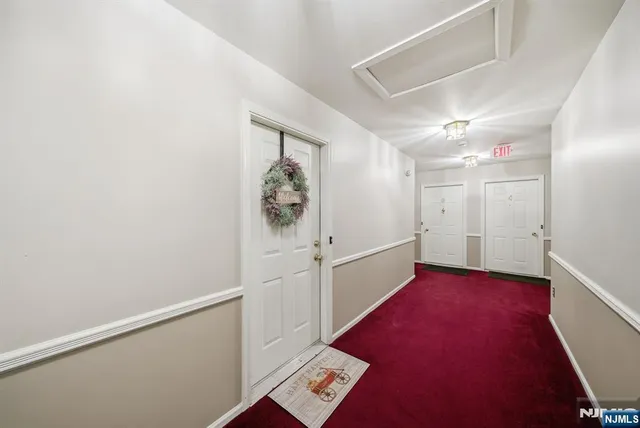 a view of a hallway with workspace