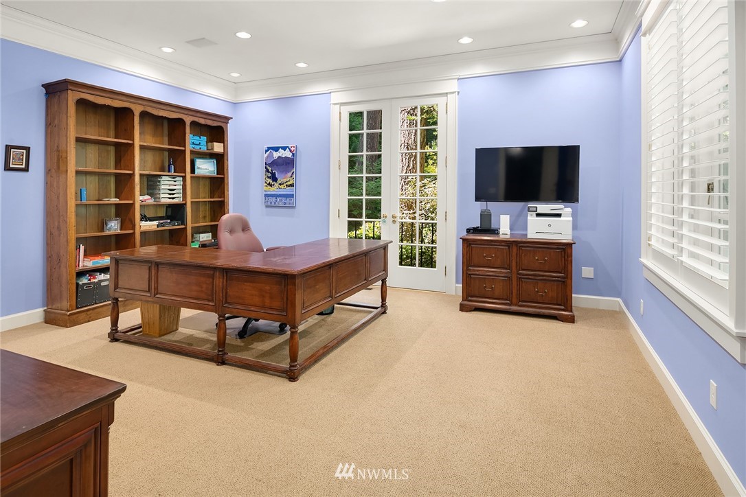142 Moss Road Shoreline, WA 98177 - Photo 14 of 32 a living room with furniture and a flat screen tv